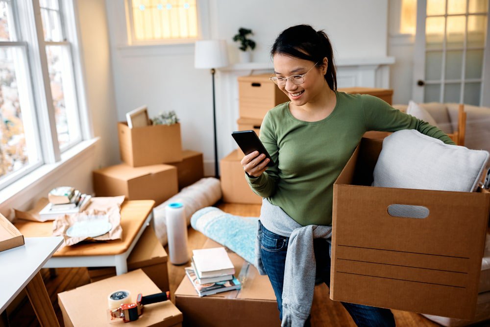 asian-woman-moving-into-apartment